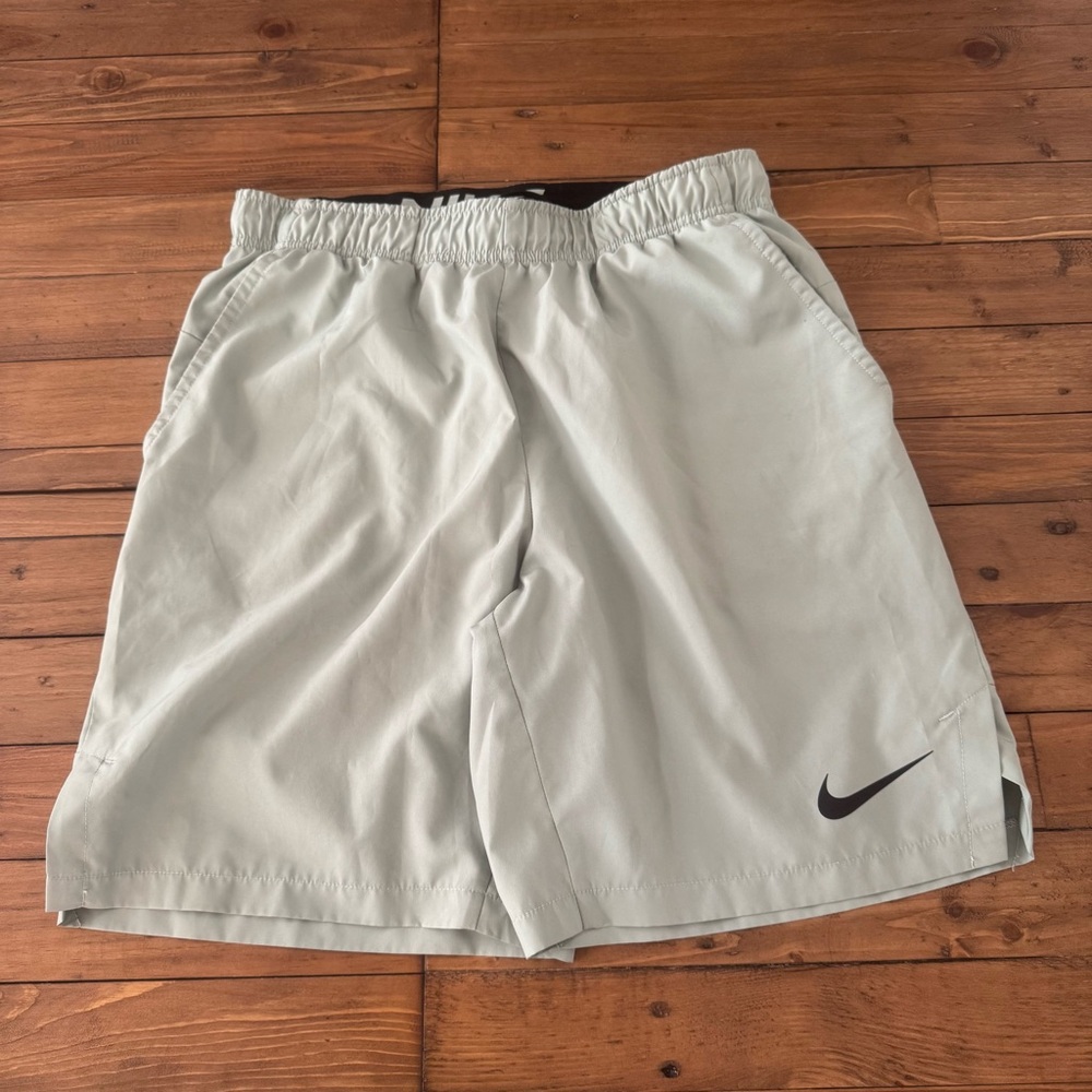 Nike Men's Light Gray Athletic Shorts with Black Swoosh